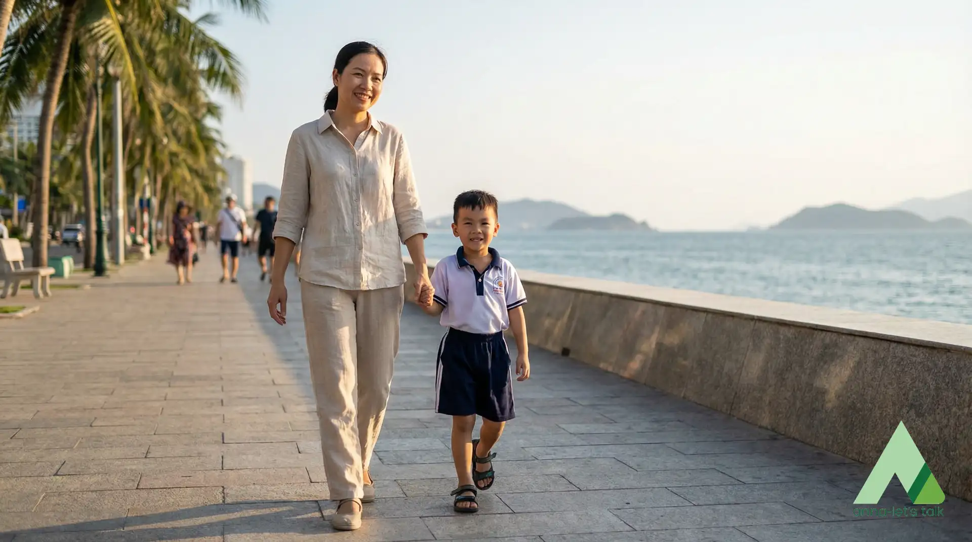 Parent and child walking on Tran Phu in Nha Trang after school