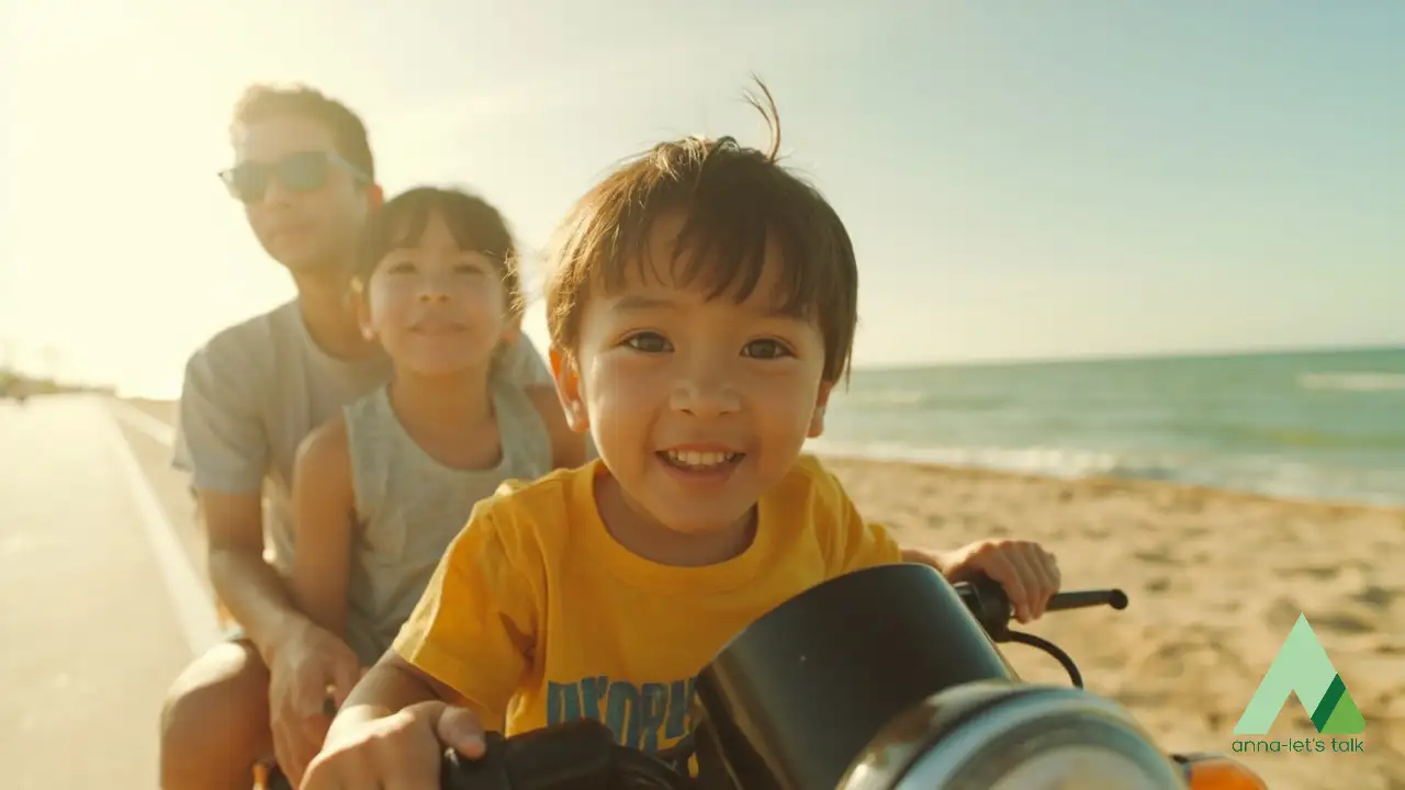 Parent and child riding a scooter along Trần Phú in Nha Trang in the early morning